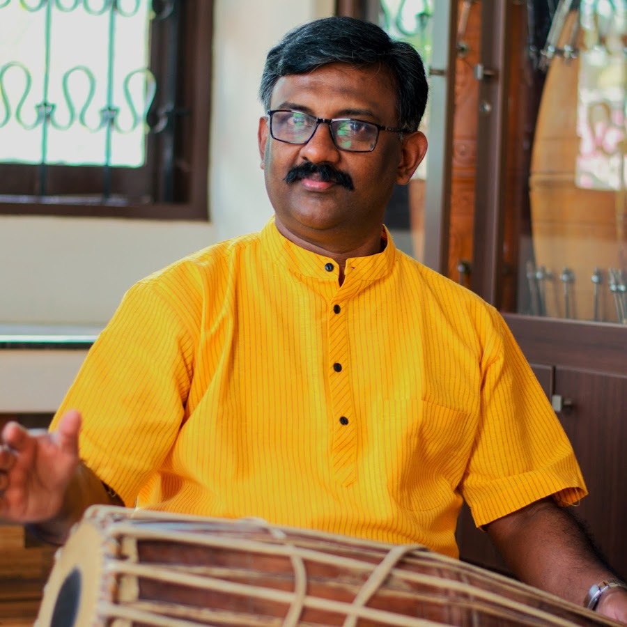 Erickavu N Sunil performing Mridangam